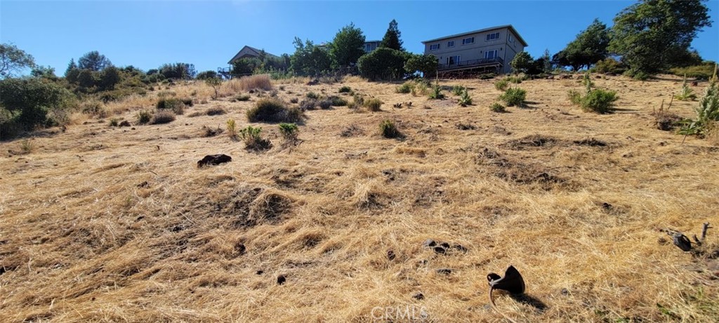 15965 Eagle Rock Road Hidden Valley Lake, CA 95467 - Photo 35 of 35 a view of a yard covered in snow