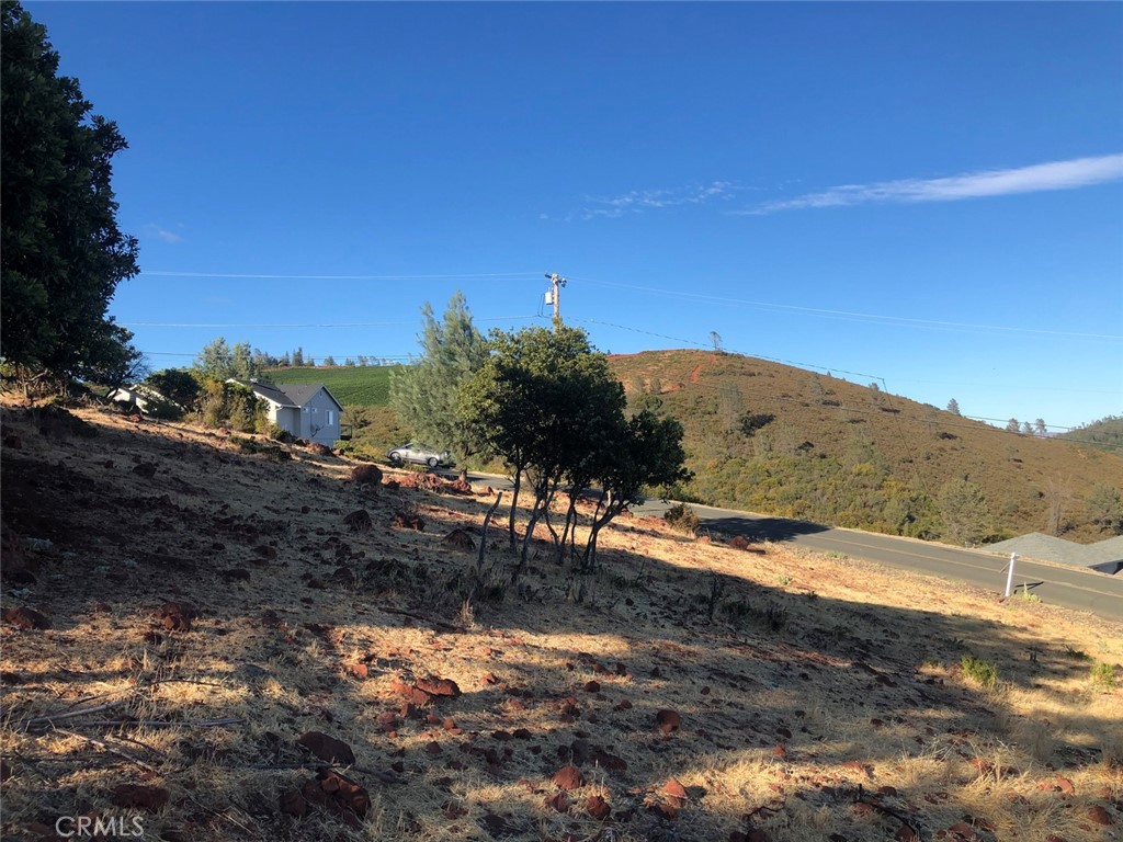 15965 Eagle Rock Road Hidden Valley Lake, CA 95467 - Photo 7 of 35 a view of a lake with mountains in the background