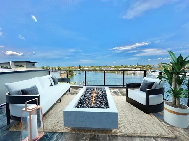 a terrace of a house with outdoor seating