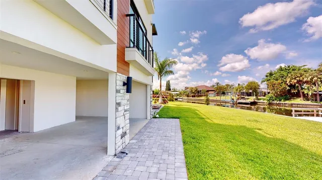 a view of a patio with swimming pool
