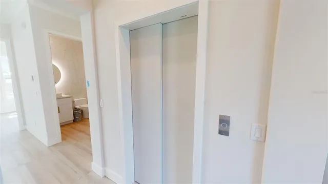 an aerial view of a house with a swimming pool