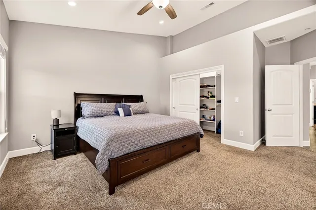 a bathroom with a double vanity sink and mirror