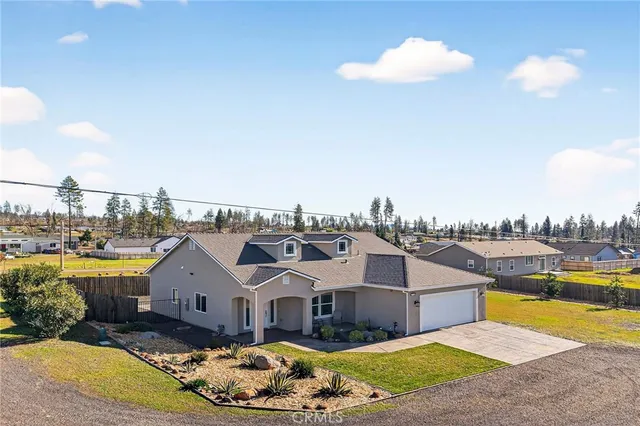 a view of a house with swimming pool