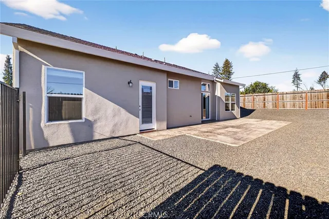 an aerial view of a residential houses with outdoor space swimming pool and outdoor seating