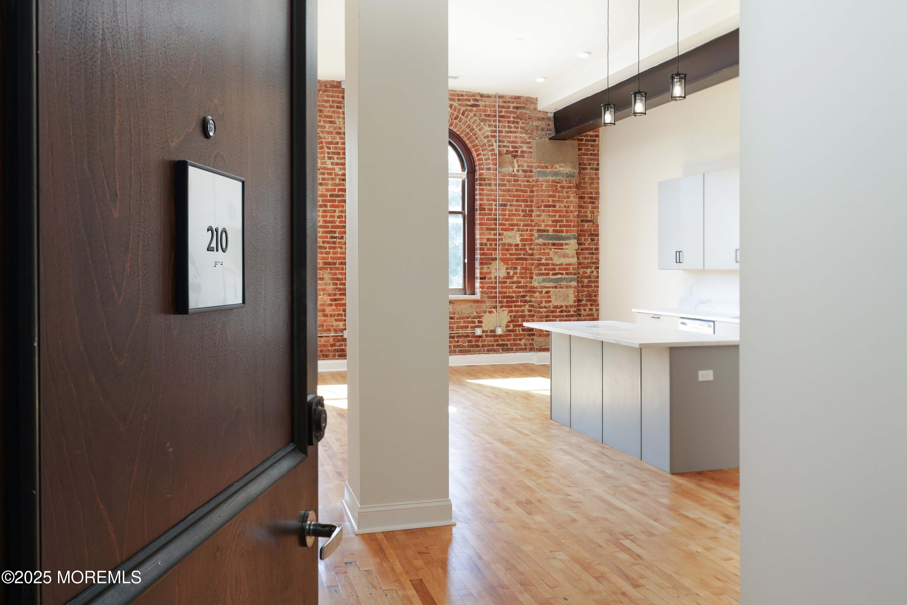 179 Chelsea Avenue, Unit 210 Long Branch, NJ 07740 - Photo 12 of 22 wooden floor in a gallery