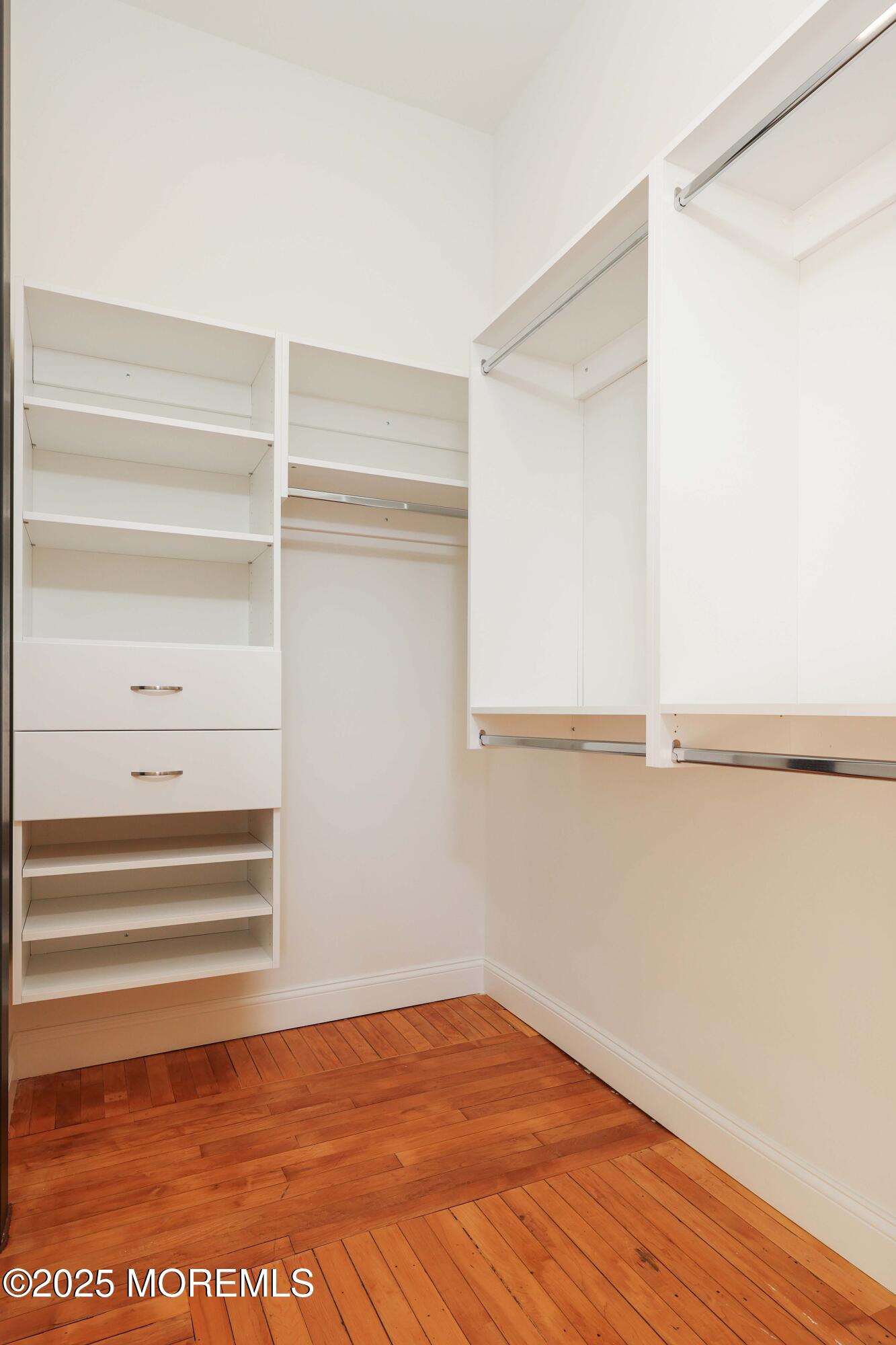 179 Chelsea Avenue, Unit 210 Long Branch, NJ 07740 - Photo 19 of 22 a view of a room with rack on the wall