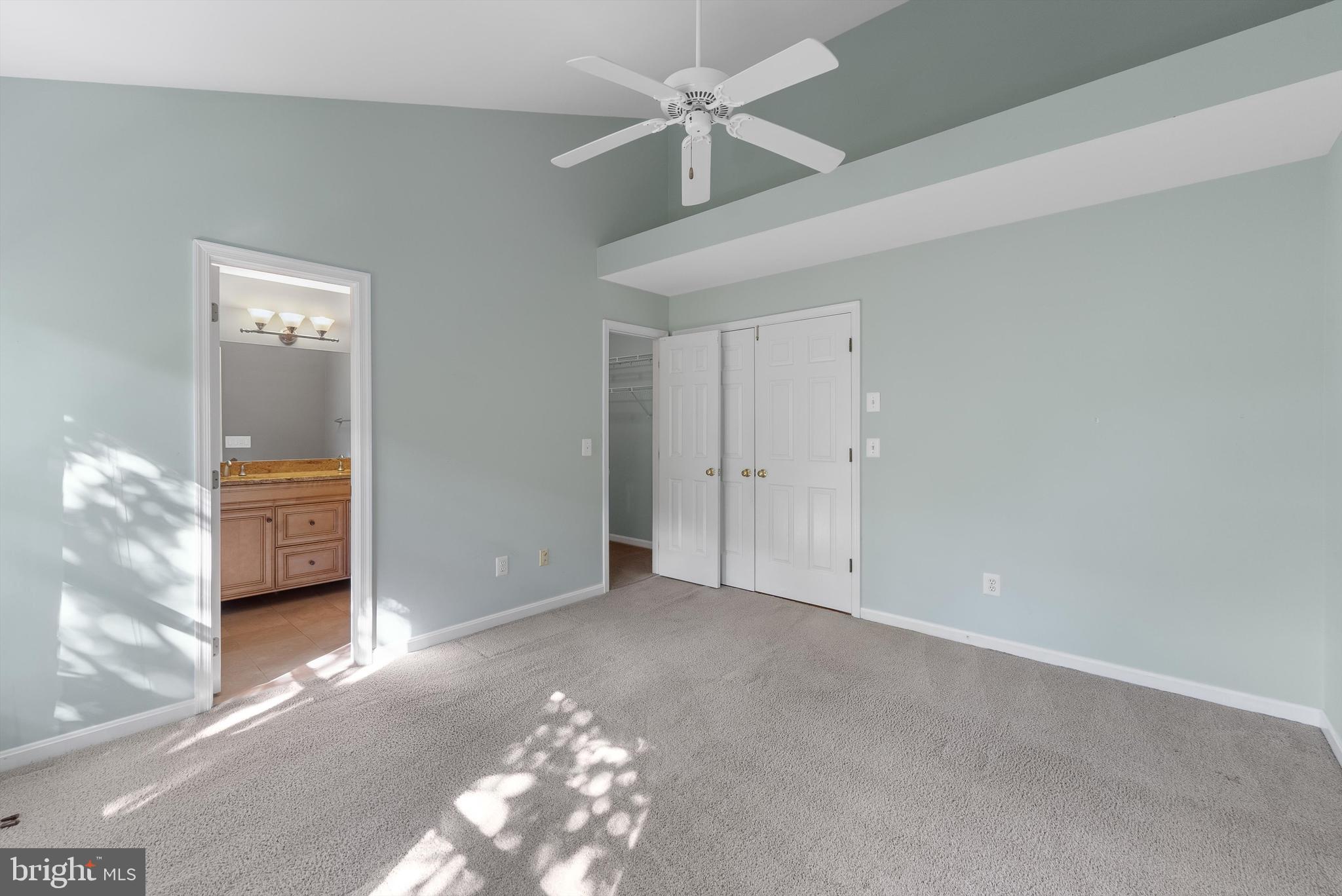 12081 Edgemere Circle Reston, VA 20190 - Photo 14 of 36 a view of a livingroom with a ceiling fan and window