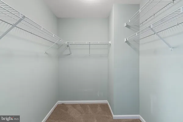 a view of small space with racks on the wall