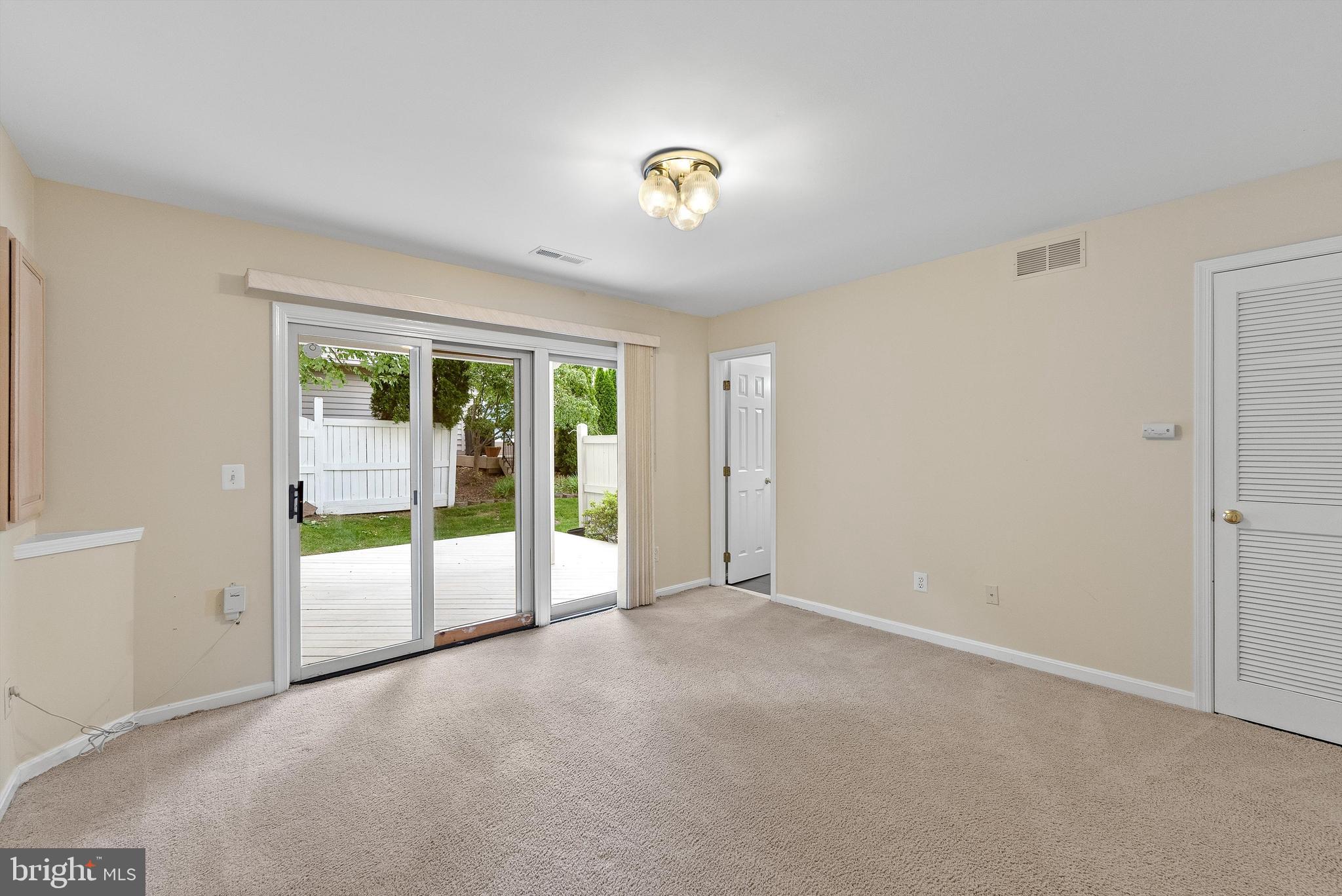 12081 Edgemere Circle Reston, VA 20190 - Photo 27 of 36 a view of an empty room with a window