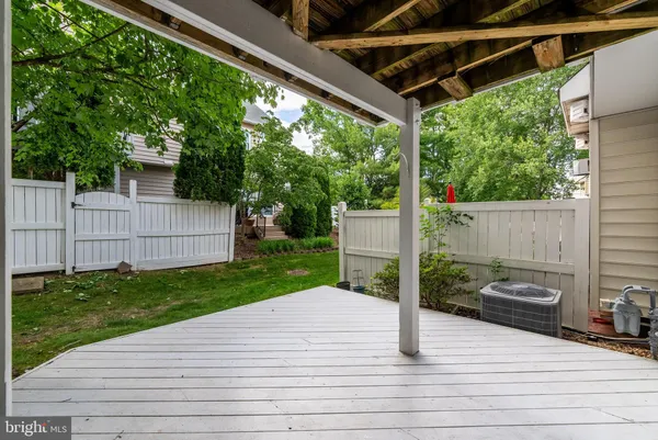 a view of a backyard with sitting area