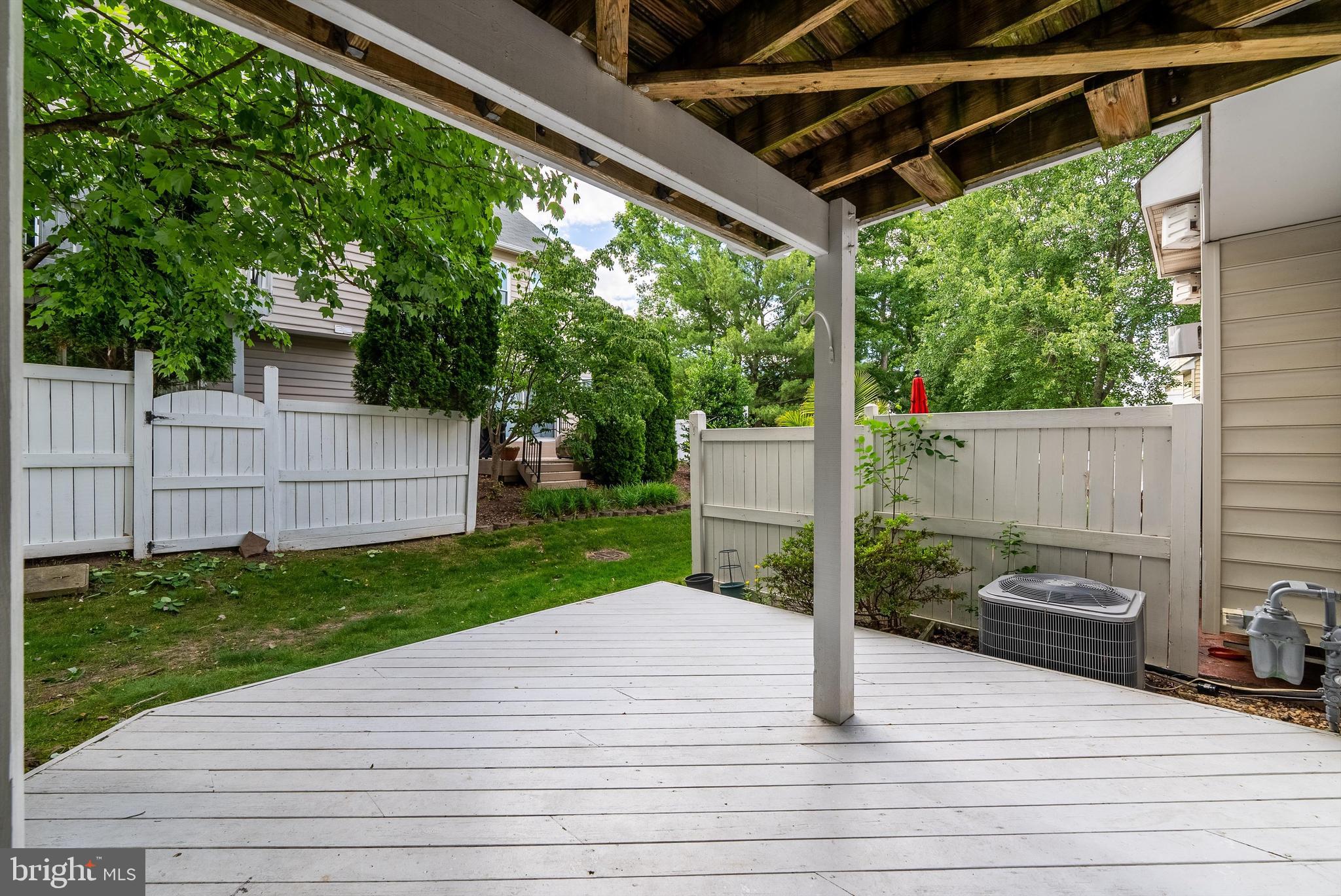 12081 Edgemere Circle Reston, VA 20190 - Photo 34 of 36 a view of a backyard with sitting area
