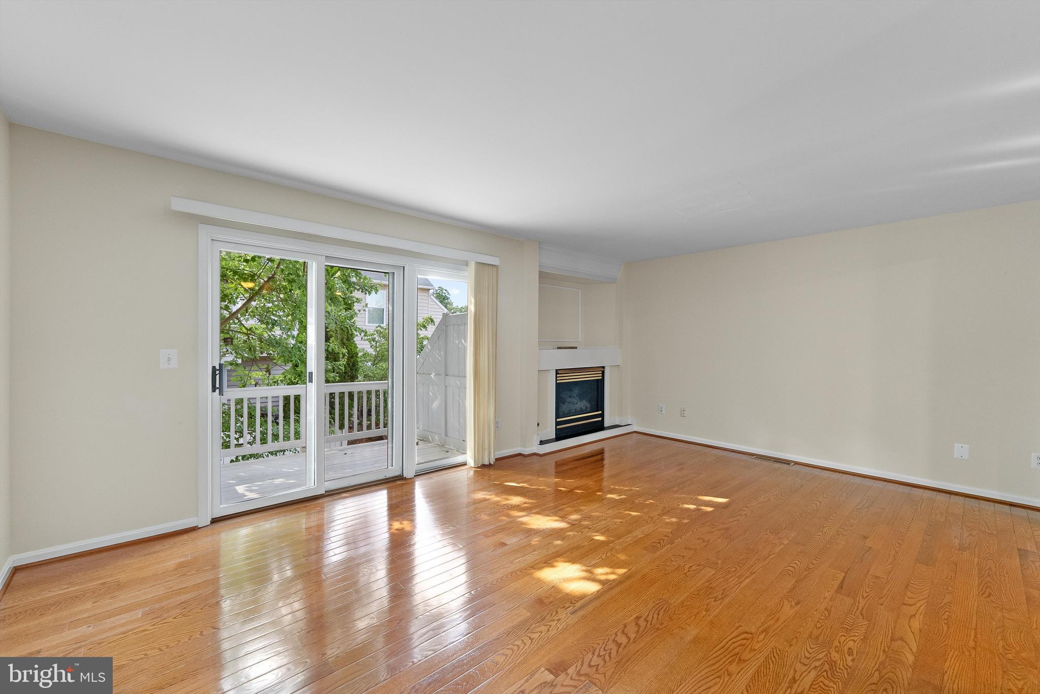 12081 Edgemere Circle Reston, VA 20190 - Photo 4 of 36 a view of an empty room with a window