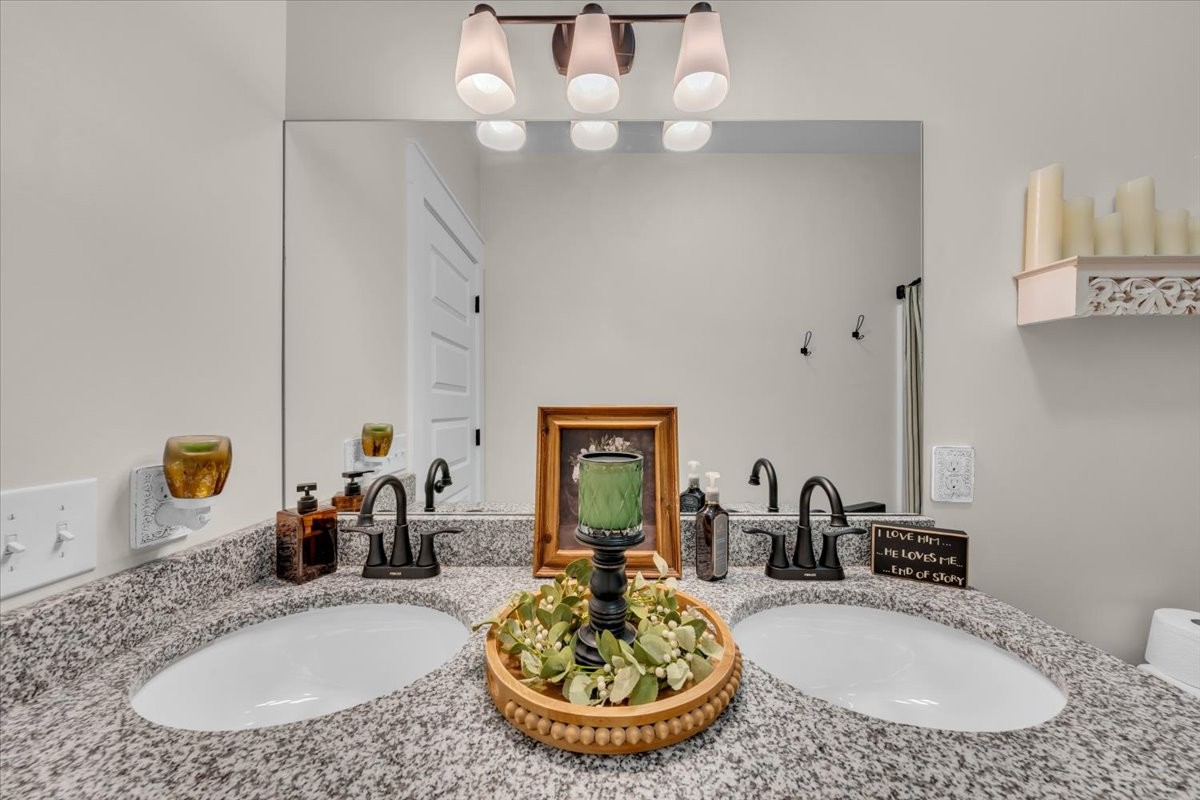 150 Edie Mae Lane Winchester, TN 37398 - Photo 23 of 79 a bathroom with a granite countertop sink and a mirror