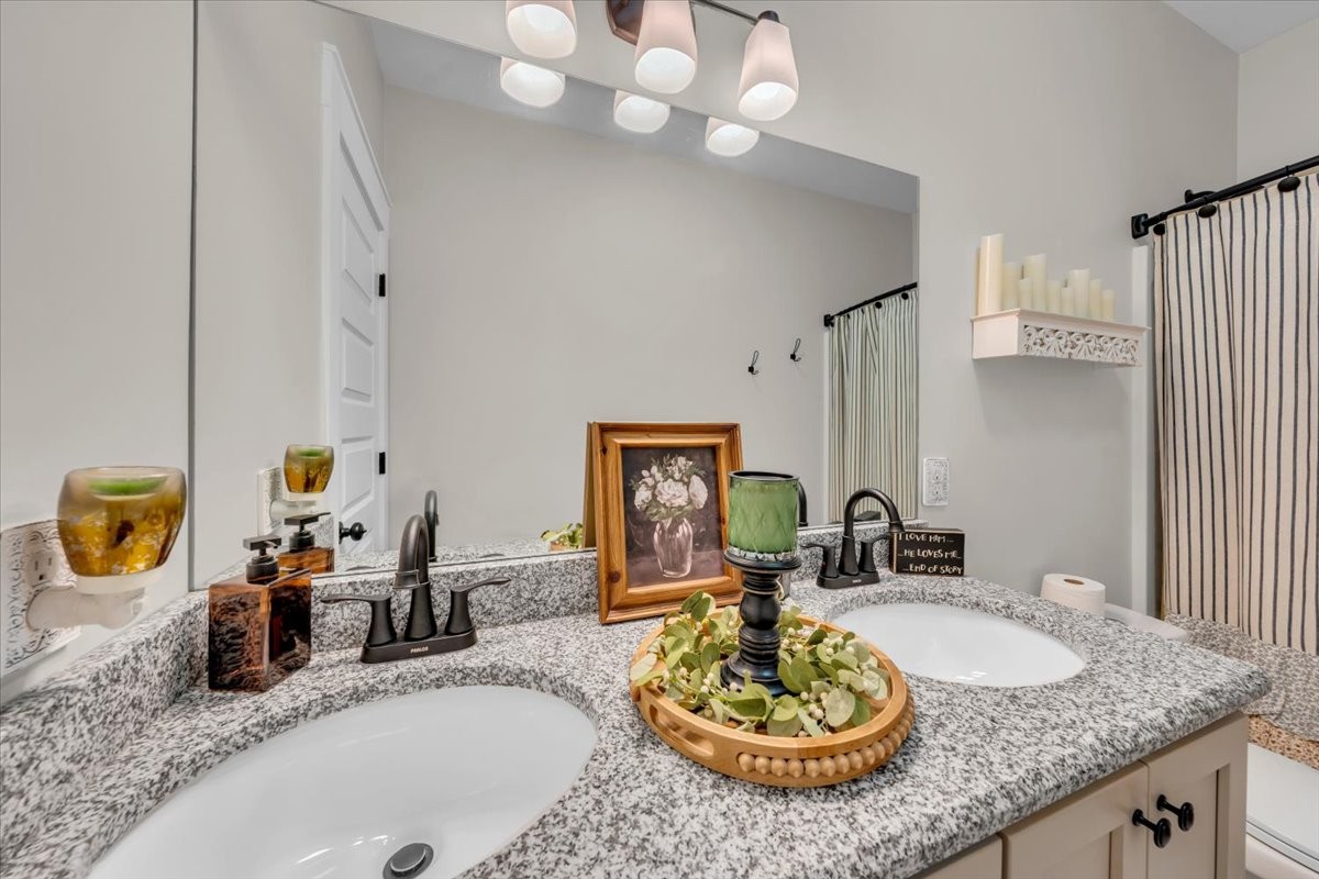 150 Edie Mae Lane Winchester, TN 37398 - Photo 24 of 79 a bathroom with a granite countertop sink and a mirror