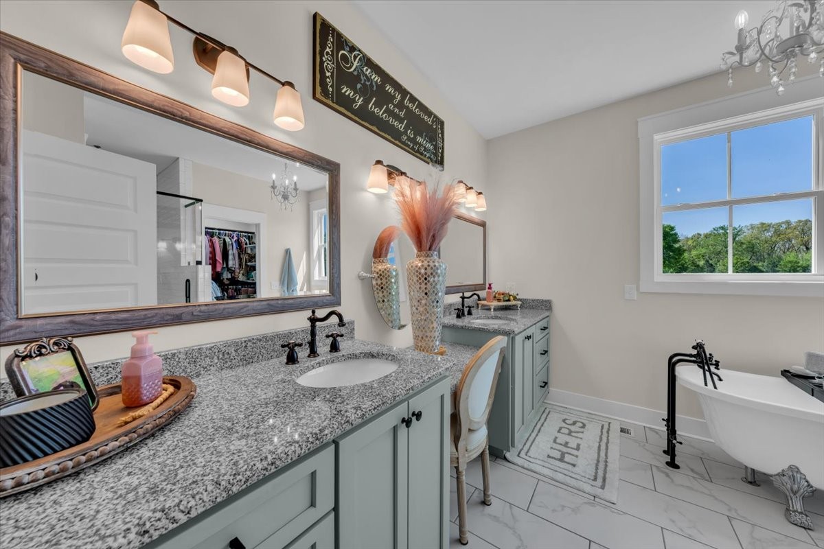 150 Edie Mae Lane Winchester, TN 37398 - Photo 28 of 79 a bathroom with a granite countertop sink and a mirror