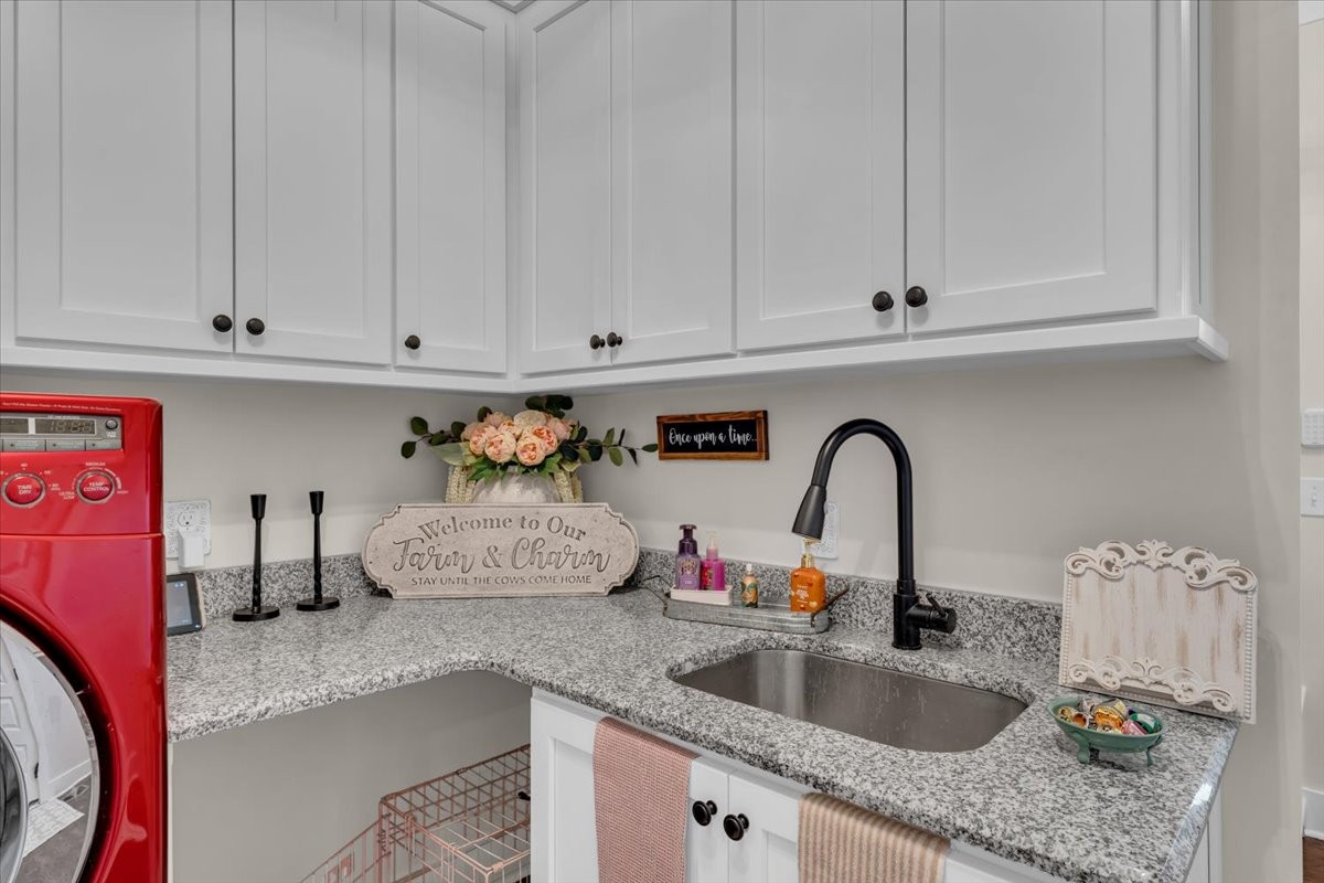 150 Edie Mae Lane Winchester, TN 37398 - Photo 40 of 79 a kitchen with granite countertop a sink and cabinets