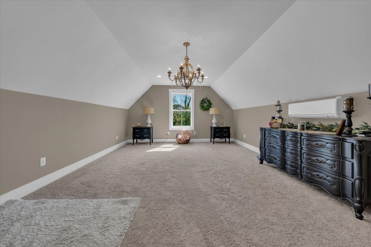 150 Edie Mae Lane Winchester, TN 37398 - Photo 47 of 79 a living room with furniture and a chandelier