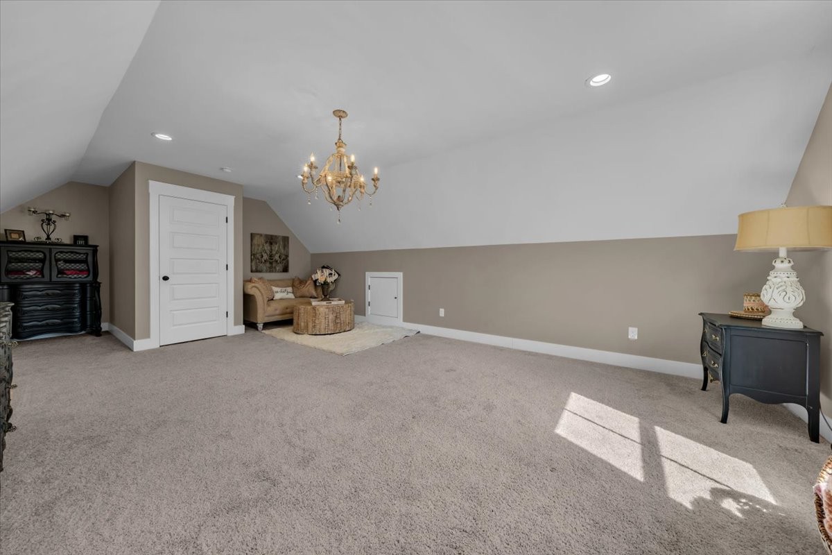 150 Edie Mae Lane Winchester, TN 37398 - Photo 48 of 79 a living room with furniture and a chandelier