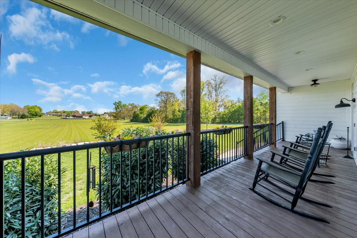 150 Edie Mae Lane Winchester, TN 37398 - Photo 5 of 79 a view of a balcony with chair and wooden floor
