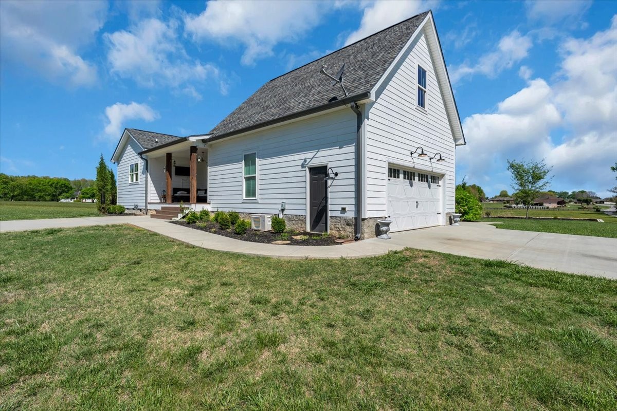 150 Edie Mae Lane Winchester, TN 37398 - Photo 51 of 79 a view of a house with backyard and trees