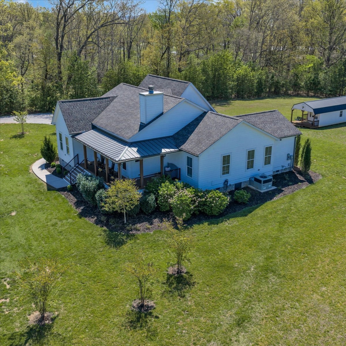 150 Edie Mae Lane Winchester, TN 37398 - Photo 71 of 79 an aerial view of a house with swimming pool and garden