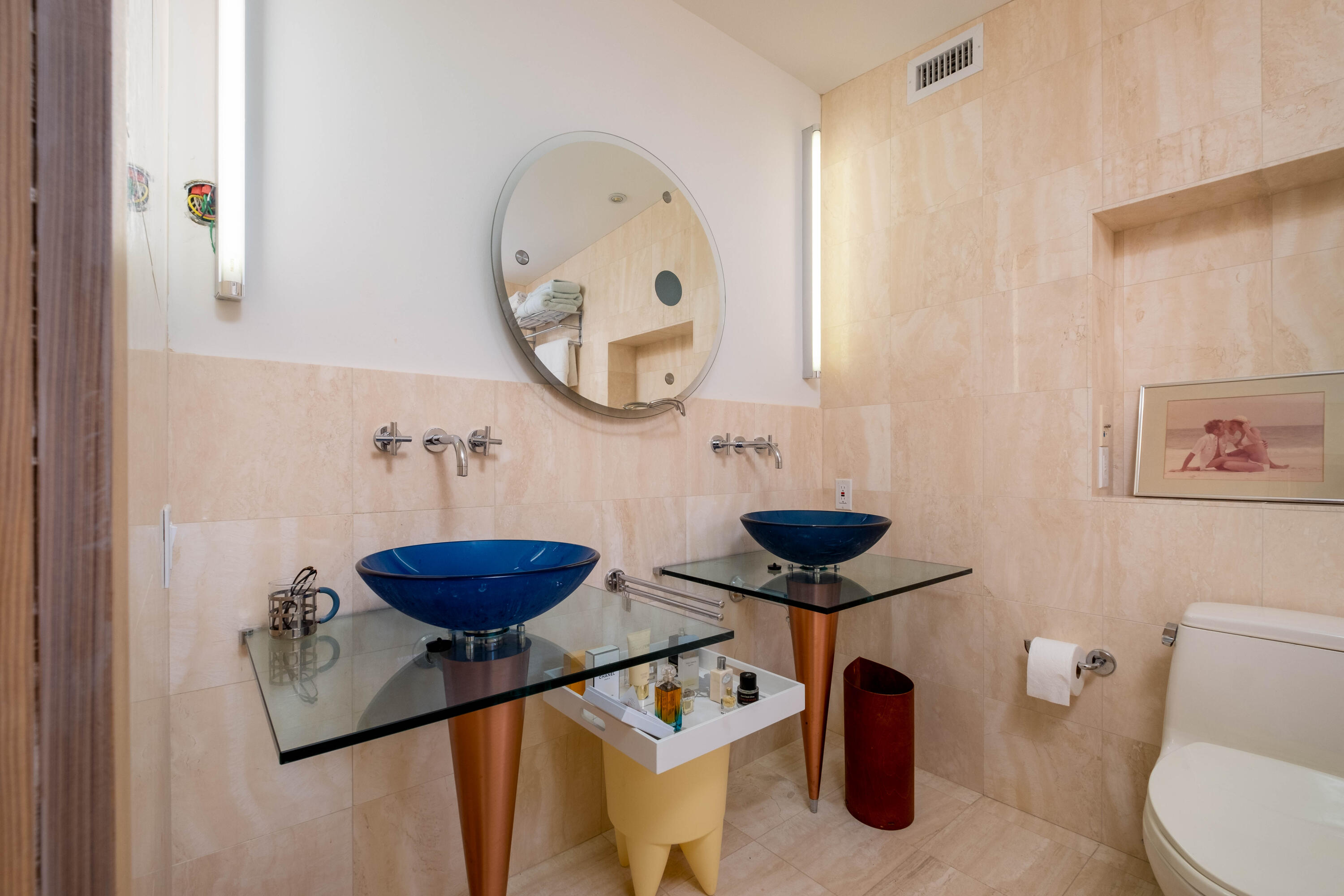 180 South Airport Road Tavernier, FL 33070 - Photo 20 of 33 a bathroom with a toilet and a mirror