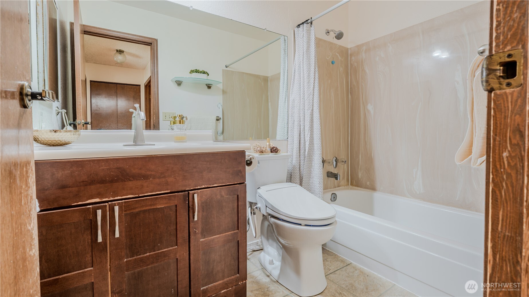 31732 47th Lane Southwest, Unit C Federal Way, WA 98023 - Photo 12 of 27 a bathroom with a sink toilet and shower