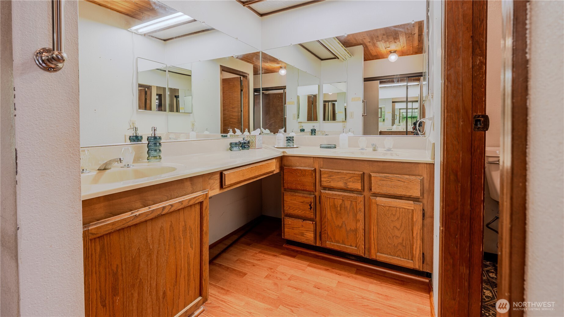 31732 47th Lane Southwest, Unit C Federal Way, WA 98023 - Photo 14 of 27 a spacious bathroom with a granite countertop sink and mirror