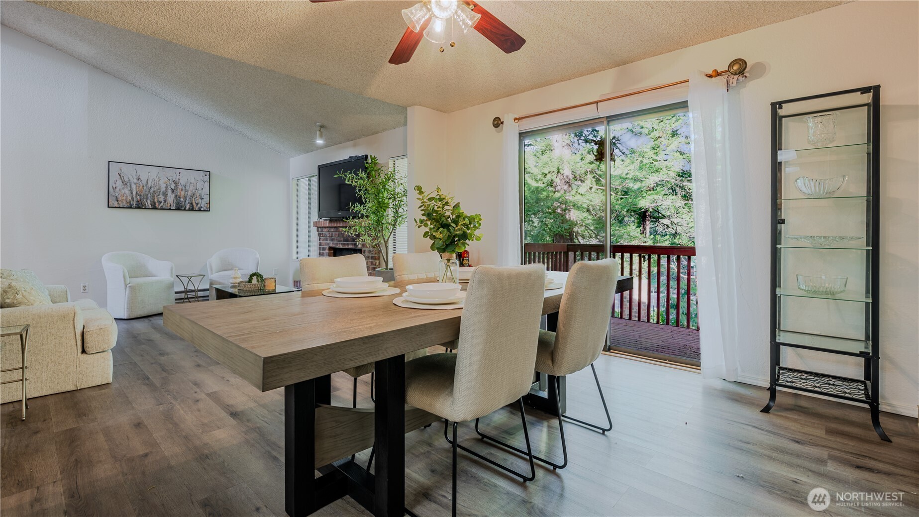 31732 47th Lane Southwest, Unit C Federal Way, WA 98023 - Photo 21 of 27 a view of a dining room with furniture window and wooden floor