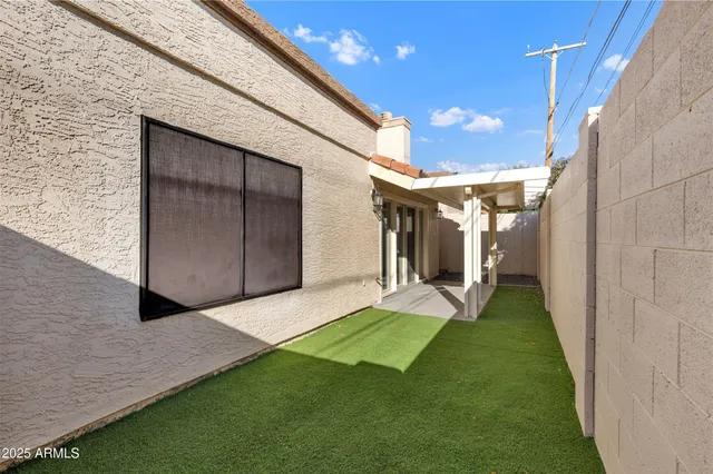 a view of a back yard of the house