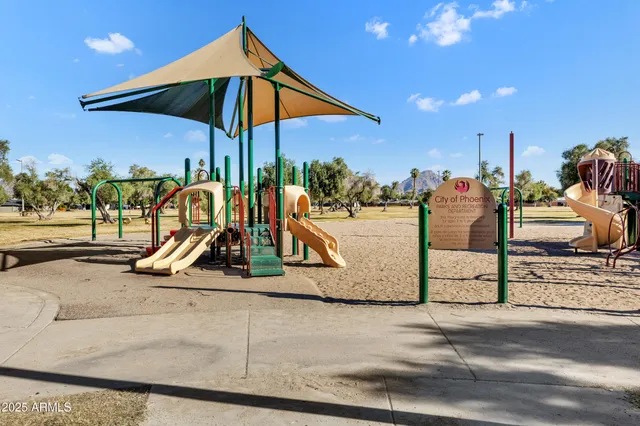 a view of a park with slide
