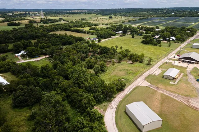 a view of a lake with a yard