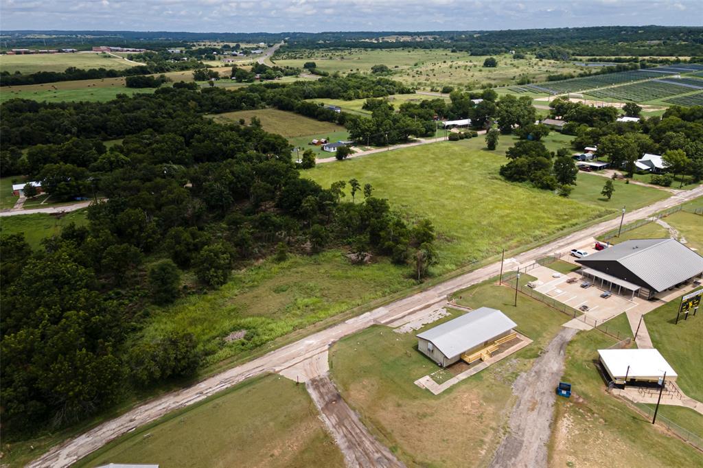 Tbd F Street Meridian, TX 76665 - Photo 20 of 21 a view of a lake with a yard