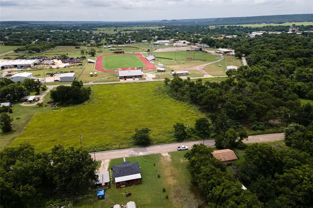 a view of a city with lawn chairs
