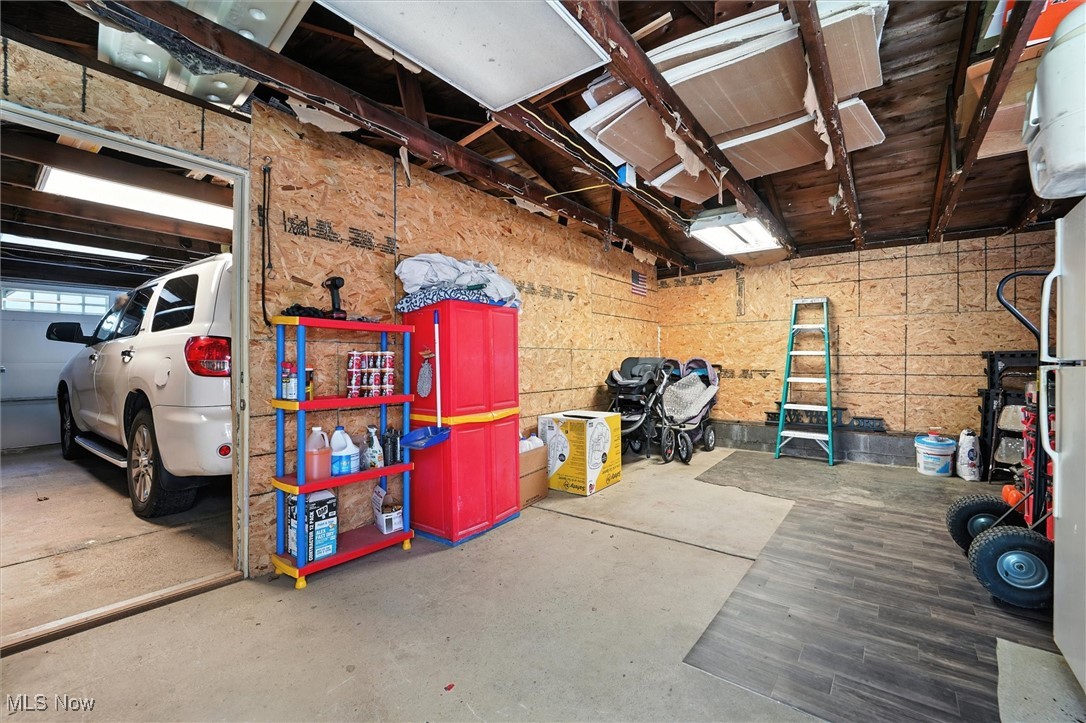 3576 Plymouth Ridge Road Kingsville, OH 44048 - Photo 43 of 43 Garage with freestanding refrigerator