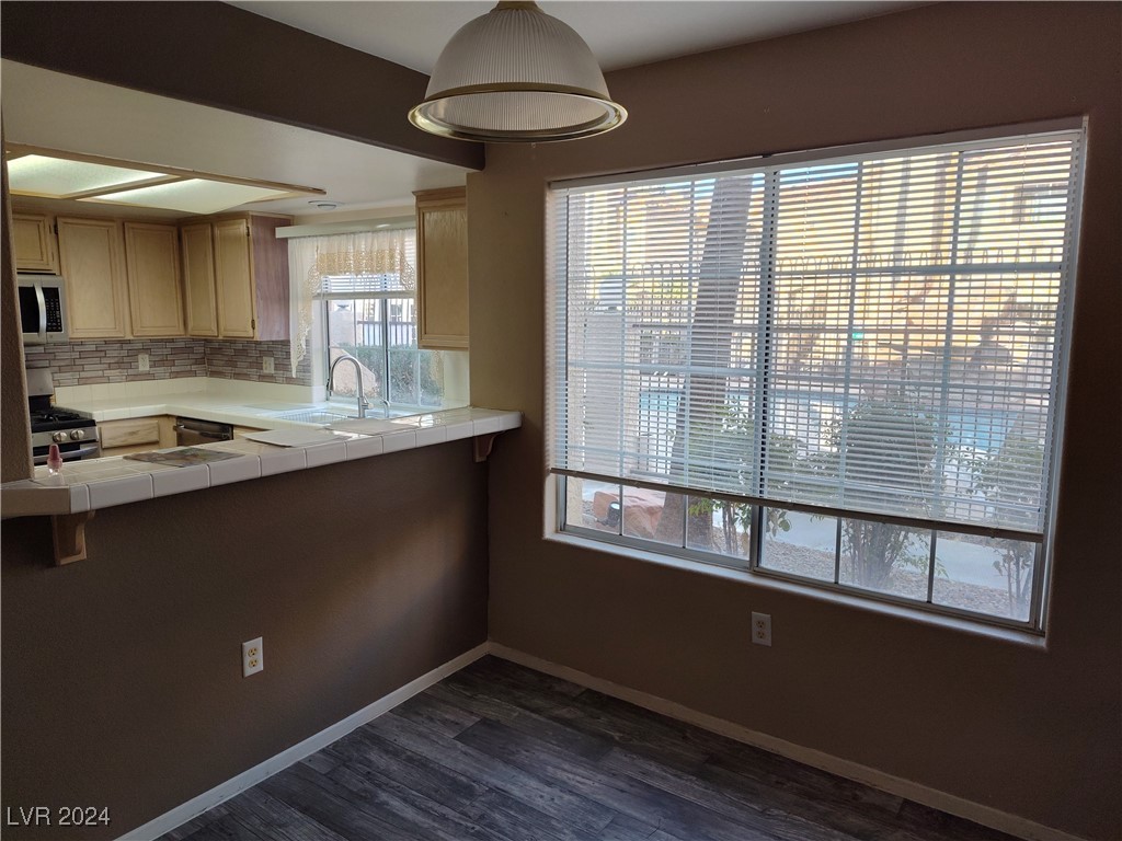 1851 Hillpointe Road, Unit 1511 Henderson, NV 89074 - Photo 5 of 10 View from dining area looking out to water, mini rock formation.