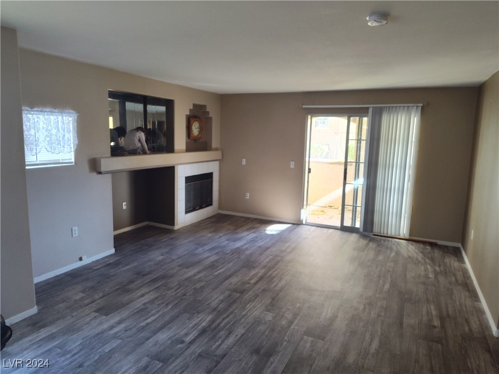 1851 Hillpointe Road, Unit 1511 Henderson, NV 89074 - Photo 6 of 10 View walking in from from door into living rm., to rear sliding doors to patio.