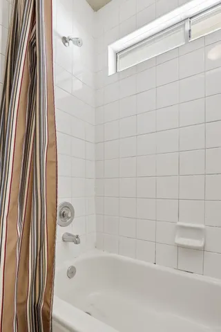 a bathroom with a bathtub