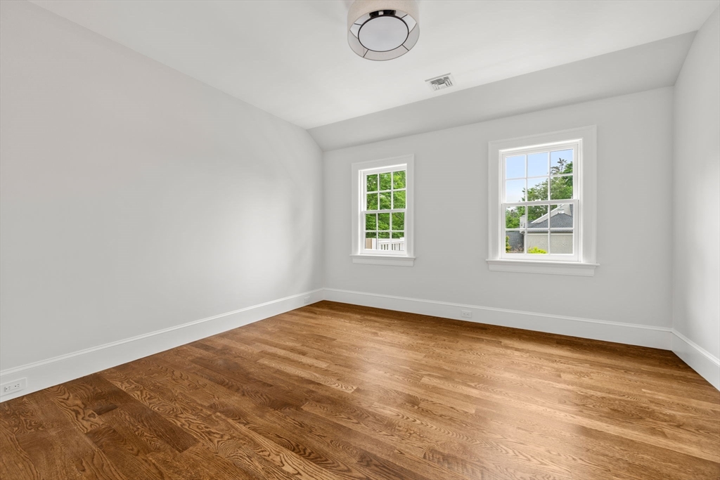 61 Heath Street Brookline, MA 02467 - Photo 30 of 40 an empty room with window