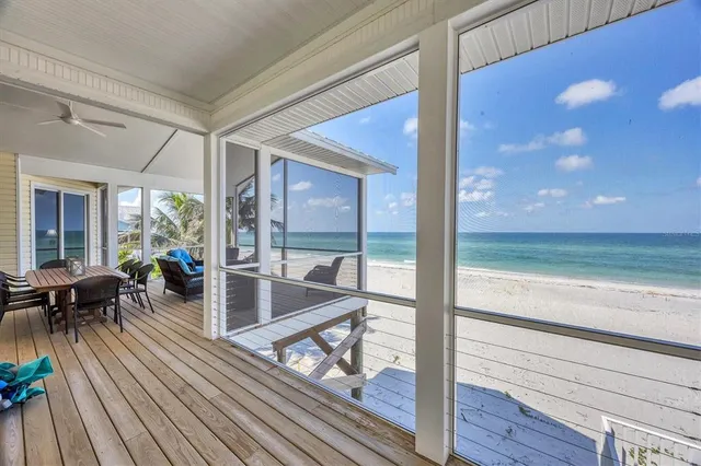 a view of swimming pool with outdoor seating