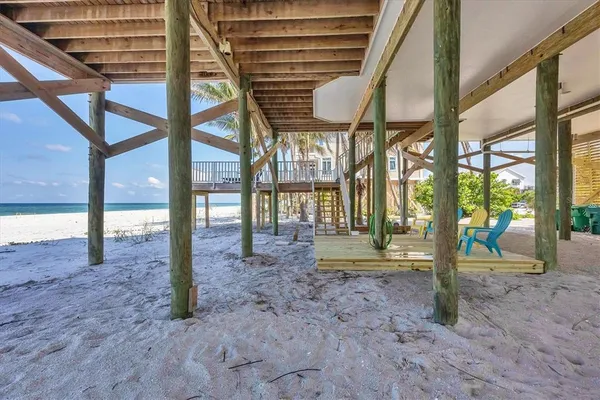 a view of outdoor space with seating area and barbeque oven