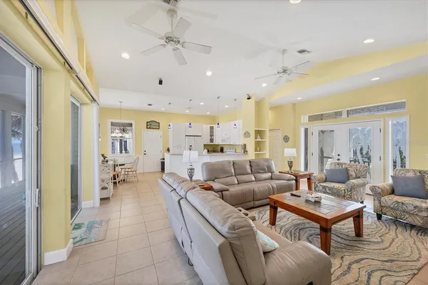 a living room with furniture and a table