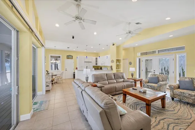a living room with furniture and a table