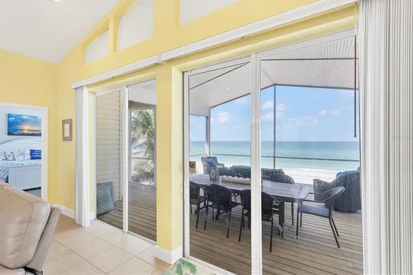 a room with furniture and a potted plant