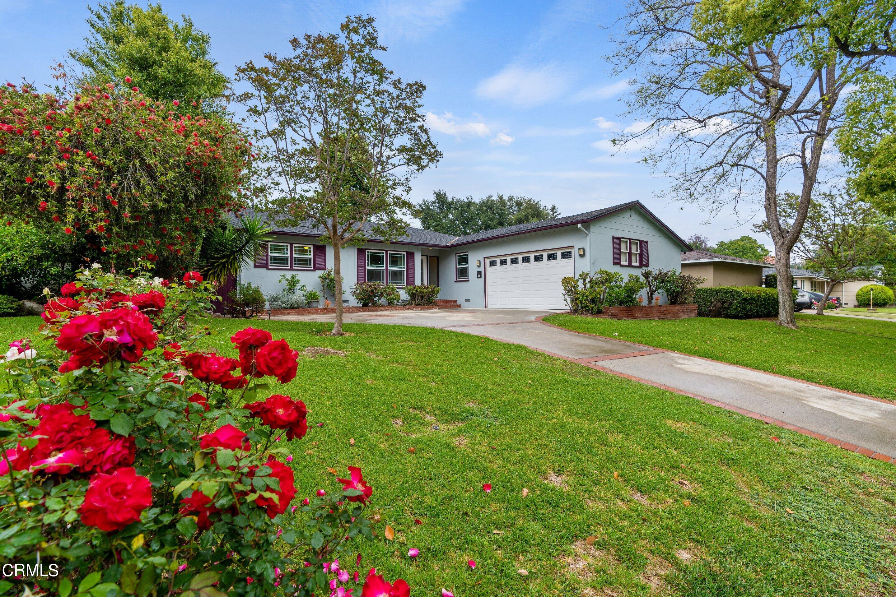 3815 Mayfair Drive Pasadena, CA 91107 - Photo 3 of 38 a front view of a house with yard and fountain