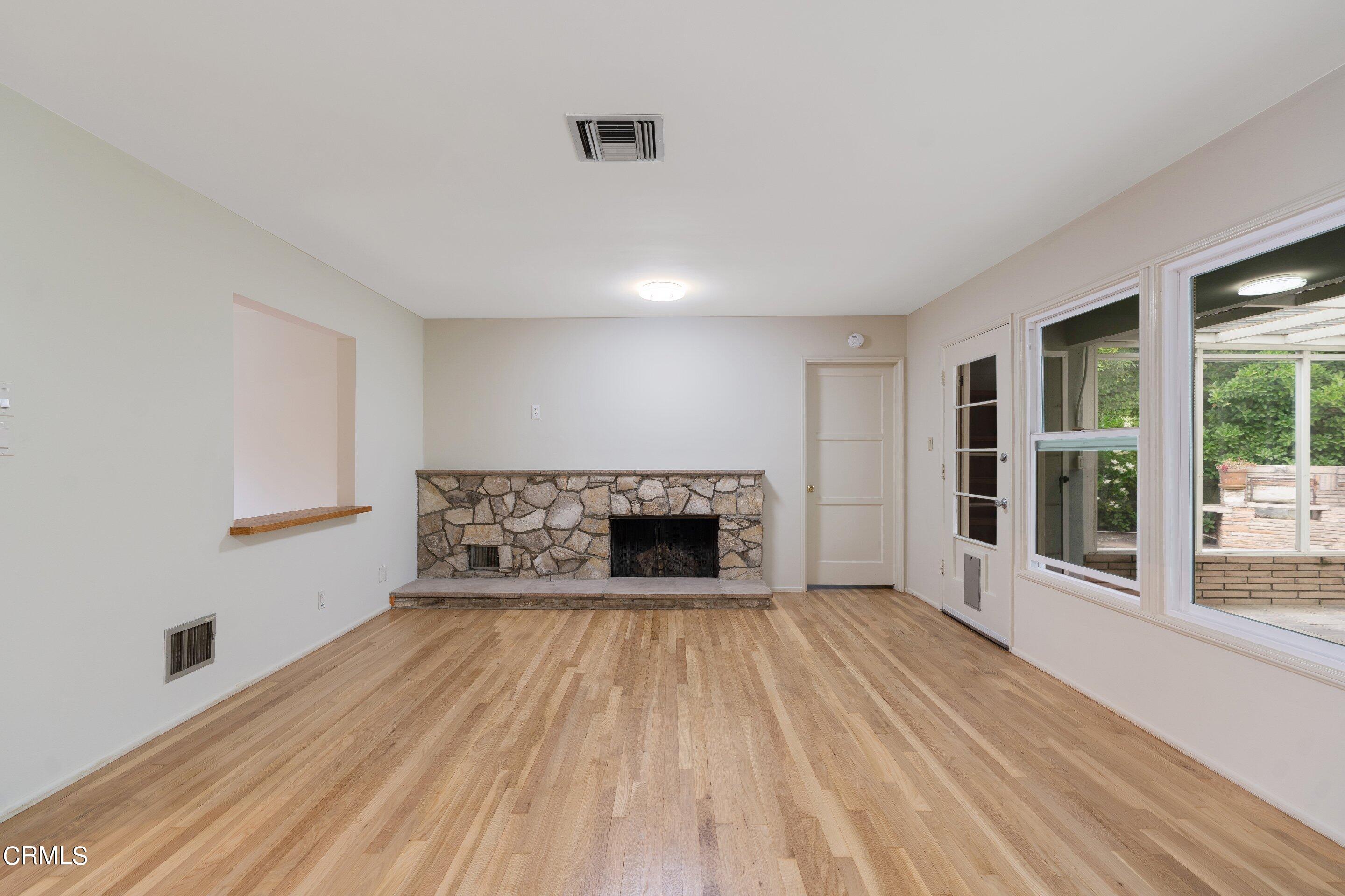 3815 Mayfair Drive Pasadena, CA 91107 - Photo 8 of 38 a view of a livingroom with a fireplace