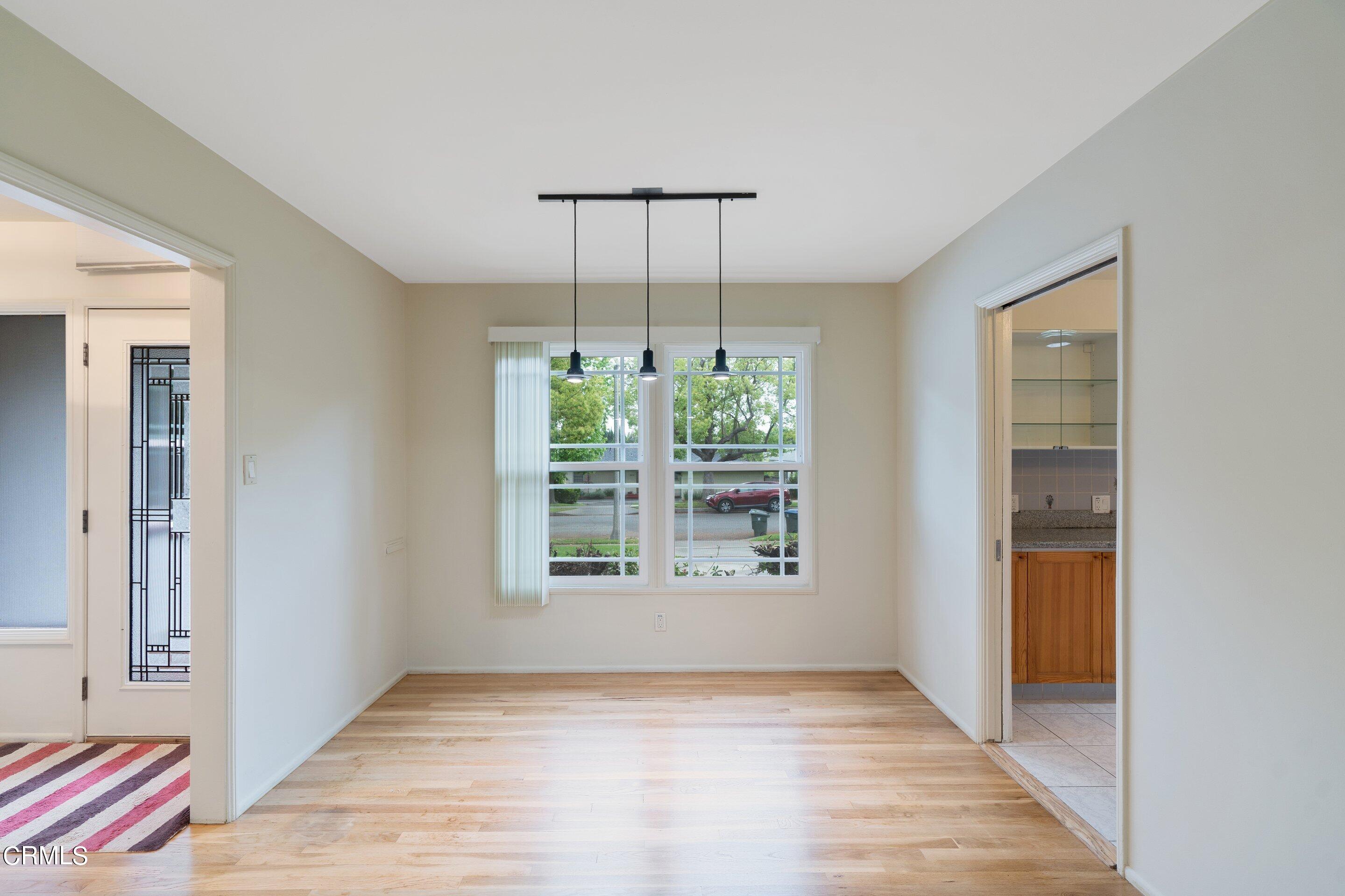 3815 Mayfair Drive Pasadena, CA 91107 - Photo 10 of 38 an empty room with windows and entrance