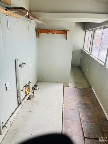 a view of storage and utility room