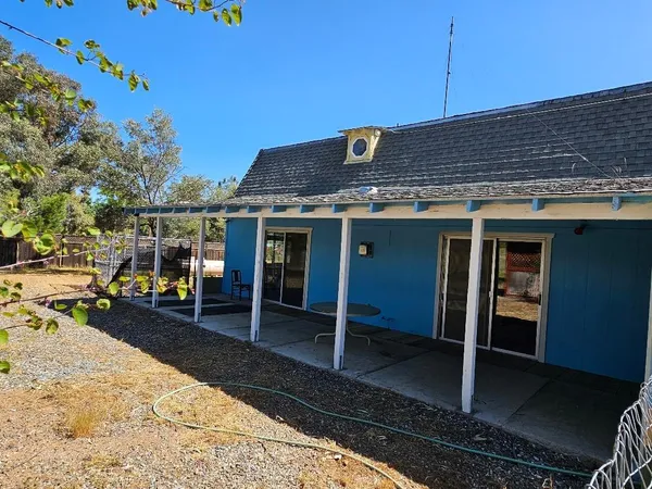 a view of a chairs setting on the deck