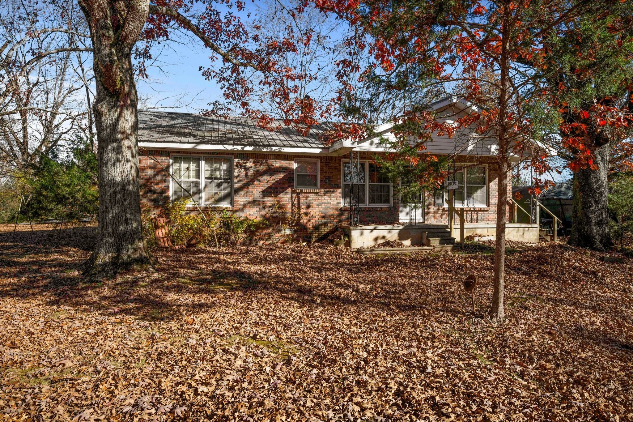 1032 Old State Rte 50 Centerville, TN 37033 - Photo 25 of 33 a view of a wooden house with a yard